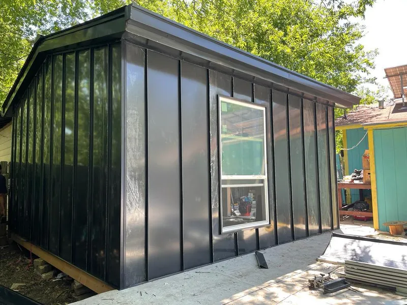 Black standing seam metal wall panels for Roof Inspection in Tupper Lake
