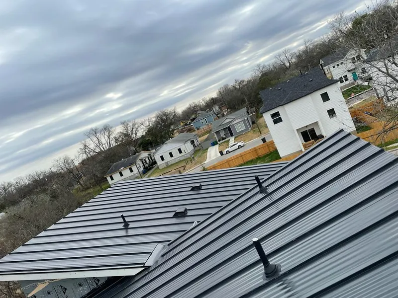 Standing seam metal roof panels with vents for Skylight Repair in Tupper Lake